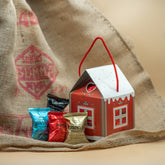 Casetta natalizia con 12 capsule di caffè - Compatibili Nespresso